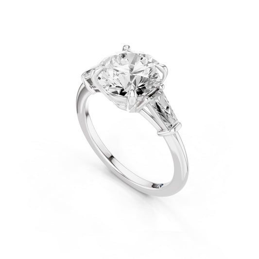 Vela – 2 Carat Round Three Stone Tapered Baguette